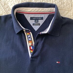 Tommy Hilfiger Men's Polo Size XL
With Multicolor Sleeve Blue Short Sleeve